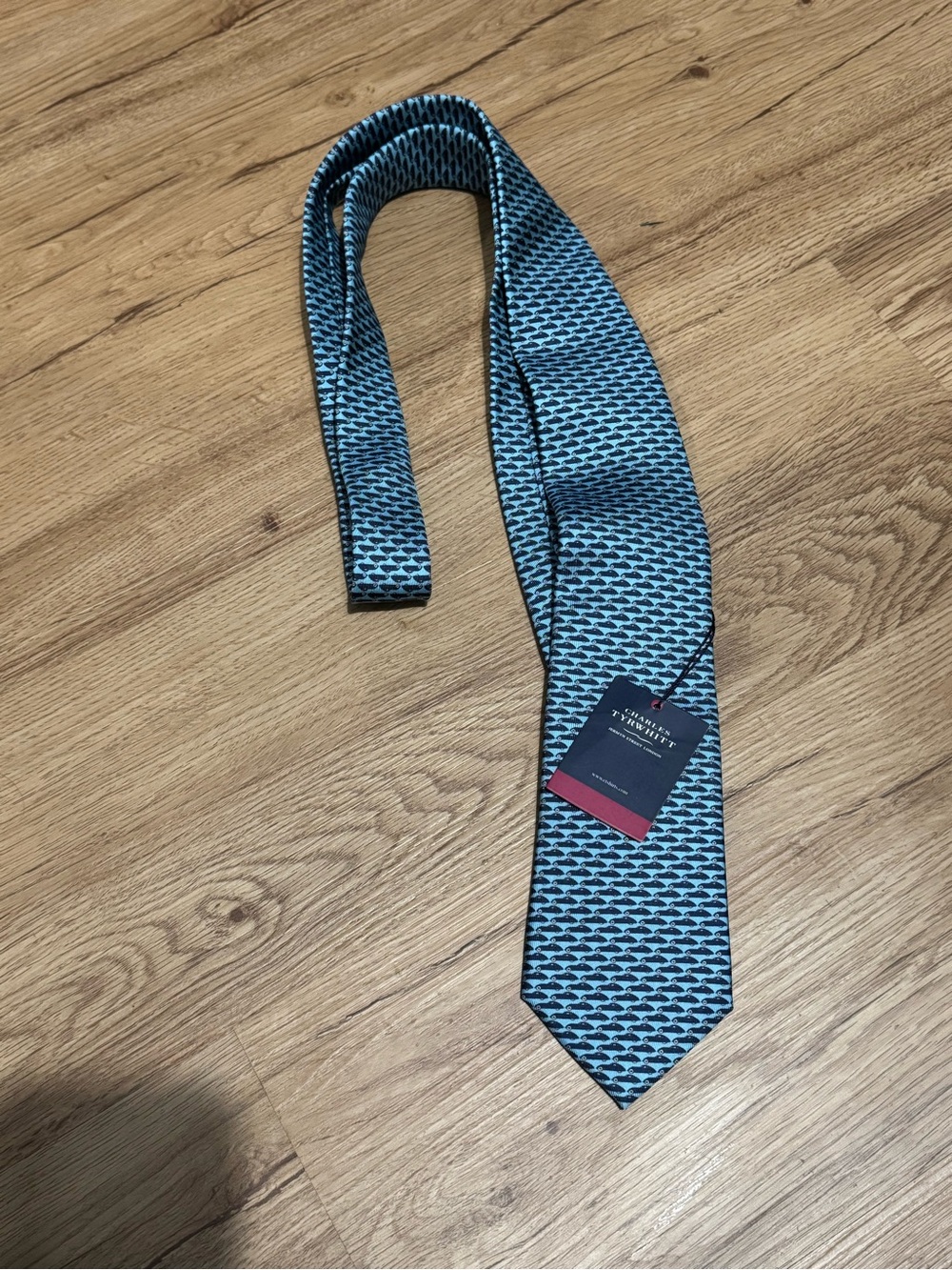 Charles Tyrwhitt %100 silk blue tie with repeating dark blue car print
